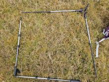 An overhead photo of plot A, with grass vegetation